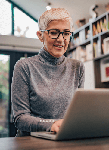 Happy woman on laptop