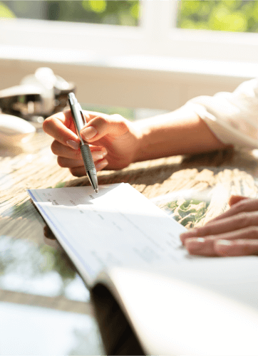 Hand writing a check
