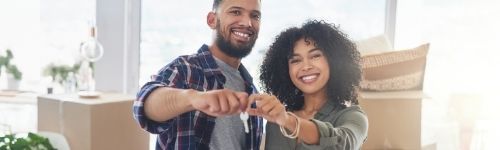 Couple holding key