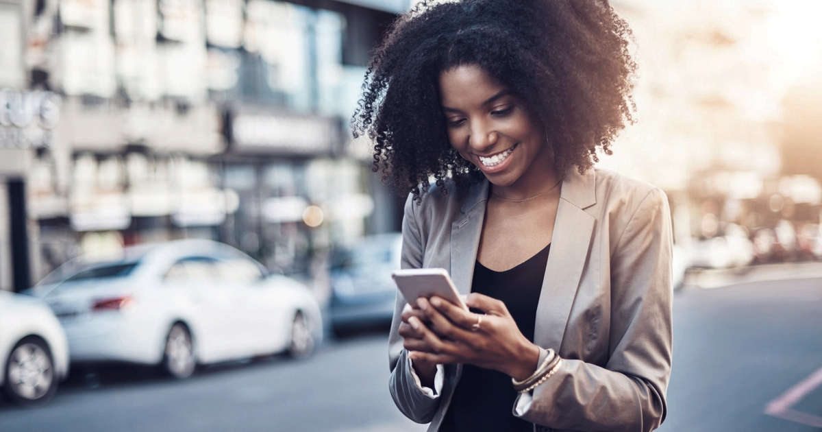 Person smiling at phone