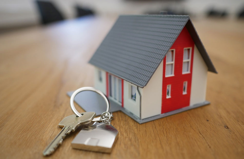 to buy or rent blog photo of a small house next to keys