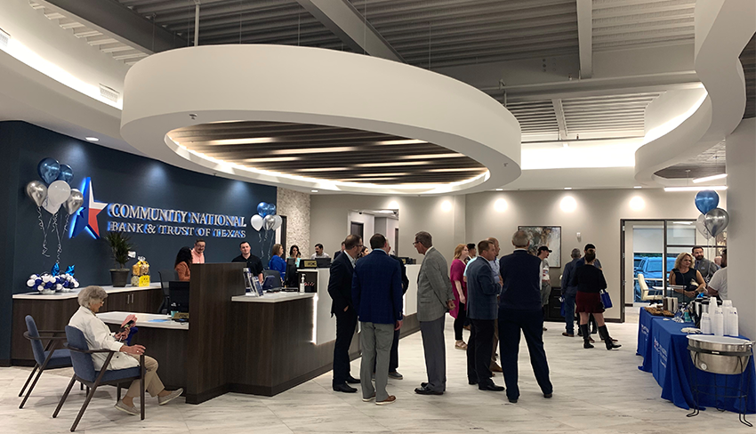 Attendees gather in the lobby of the Waxahachie branch for the grand opening event
